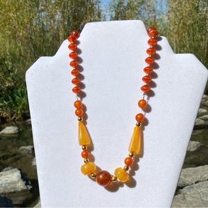Vintage women amber colour beads with gold tone spacers stringed necklace. Used.